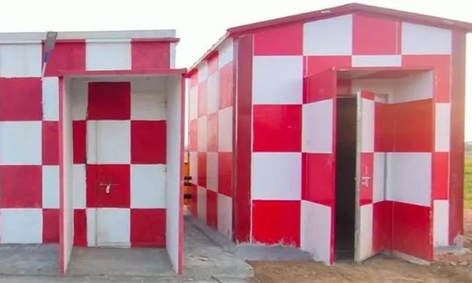 Red-and-white chequered frangible equipment huts at an aerodrome