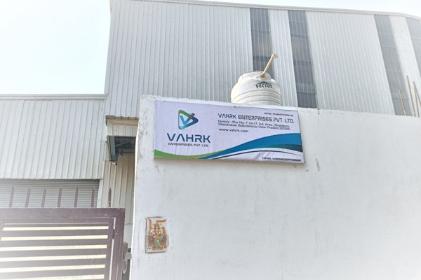Vahrk Enterprises Pvt. Ltd. signboard on the factory wall at Sikandrabad